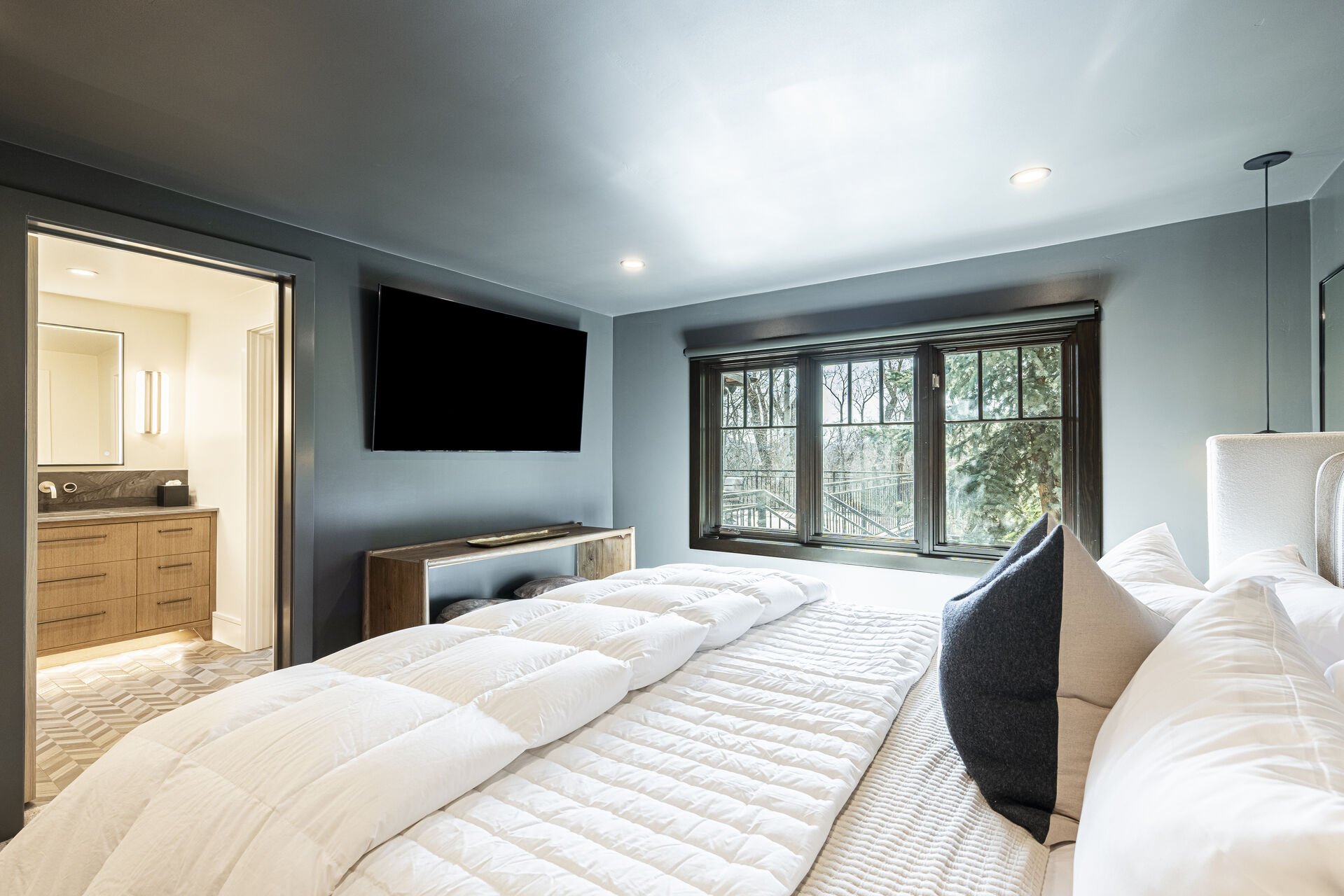 Sun Peak Manor House - Guest Bedroom 3 with a king bed, Smart TV and en suite Sun Peak Manor House - Guest Bedroom 3 with a king bed, Smart TV and en suite