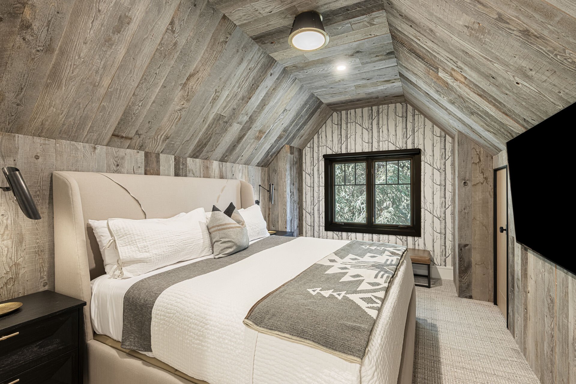 Sun Peak Manor House - Upper Level Guest Bedroom 4 with a king bed, smart TV and en suite Sun Peak Manor House - Upper Level Guest Bedroom 4 with a king bed, smart TV and en suite