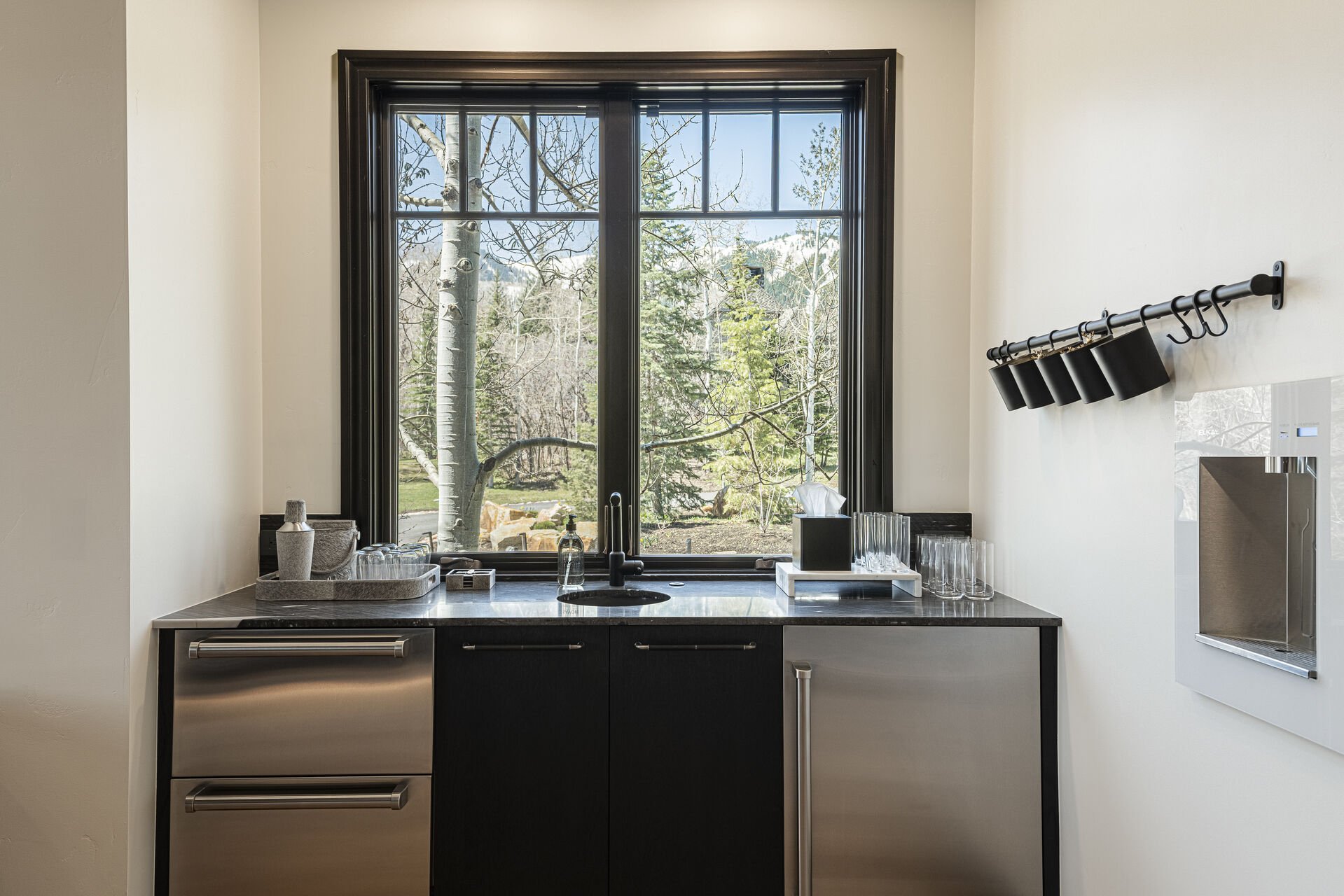 Peak 5 Cabin - Wet bar with mini fridge, refrigerator beverage drawers and a water dispenser Peak 5 Cabin - Wet bar with mini fridge, refrigerator beverage drawers and a water dispenser