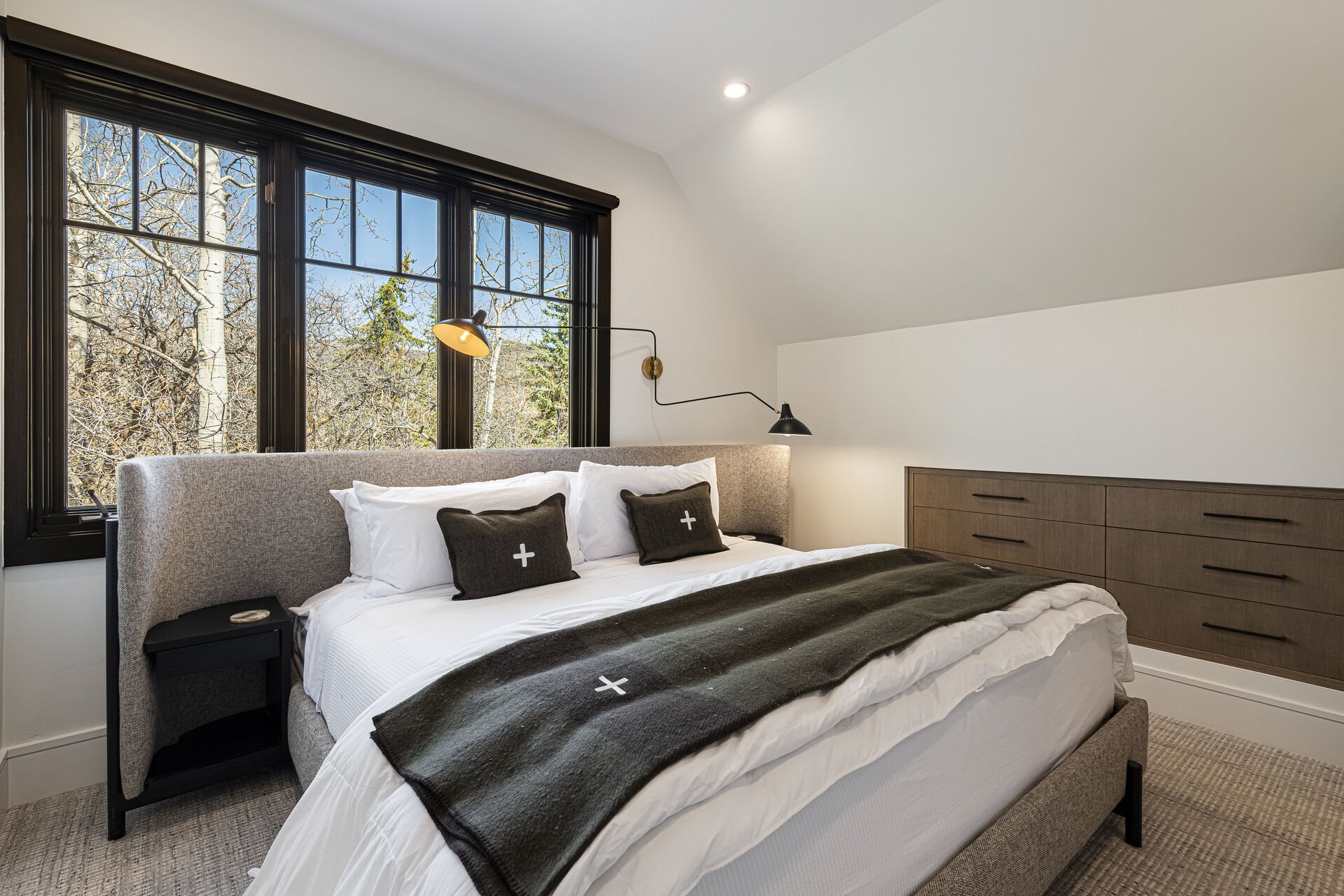 Iron Mountain Loft - Primary Bedroom 10 with a king bed and wall storage Iron Mountain Loft - Primary Bedroom 10 with a king bed and wall storage