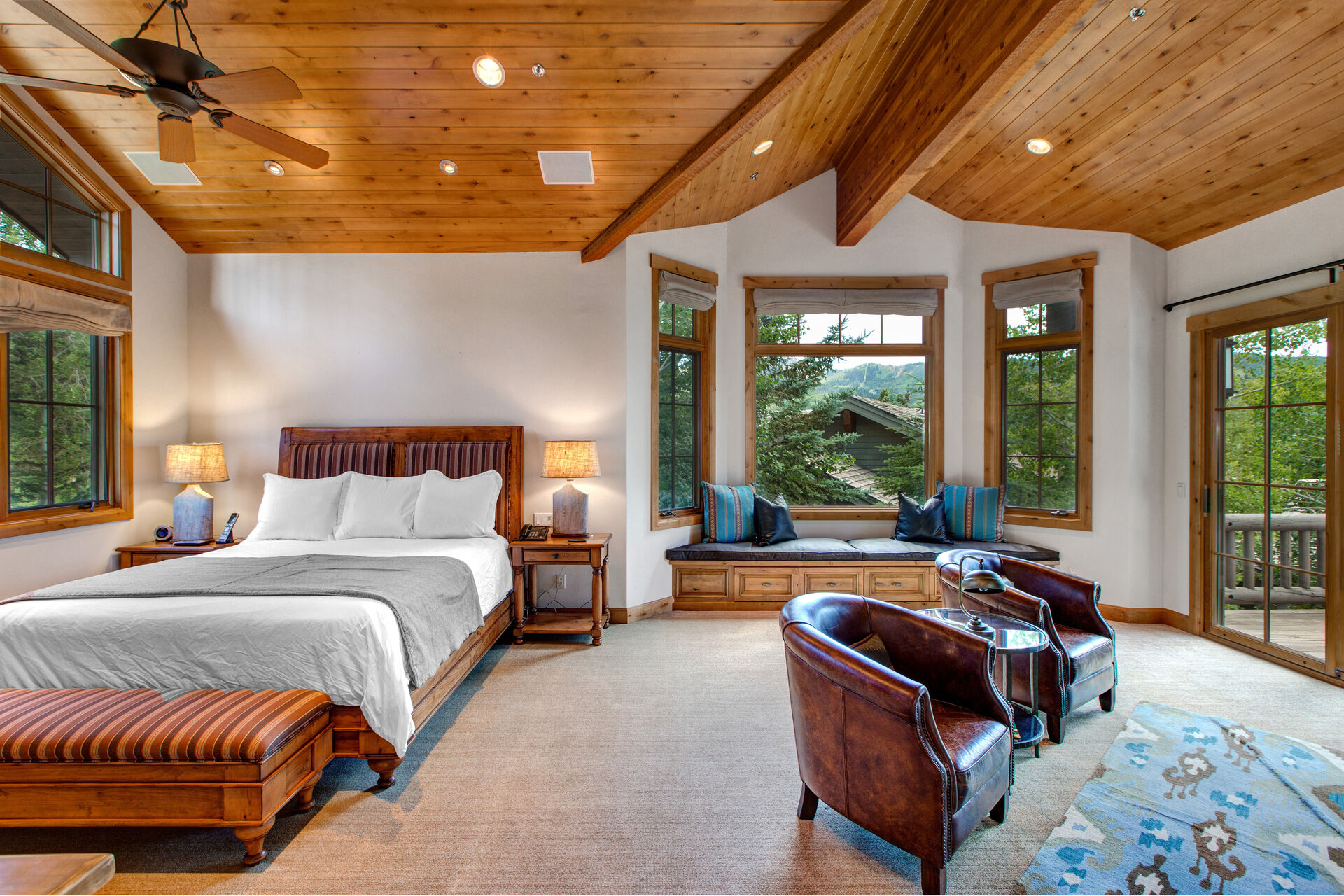 Bedroom with Mountain View Balcony in Our Park City Vacation Rentals.